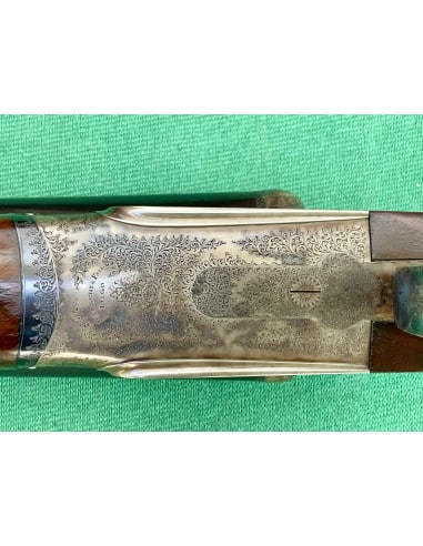 Doppietta F.lli Toschi calibro 12 Canne 70cm.  Bascula finemente incisa e tartarugata.