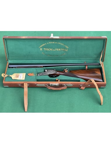 Doppietta F.lli Toschi calibro 12 Canne 70cm.  Bascula finemente incisa e tartarugata.